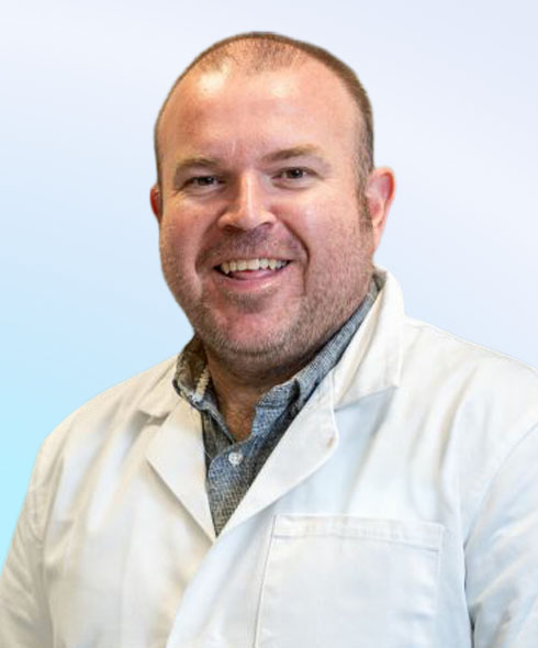 Headshot of Professor Christopher McConville.